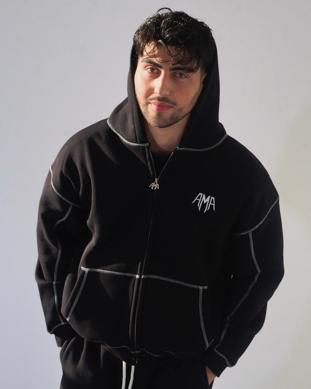 THE BASIC BLACK HOODIE AMARTIA