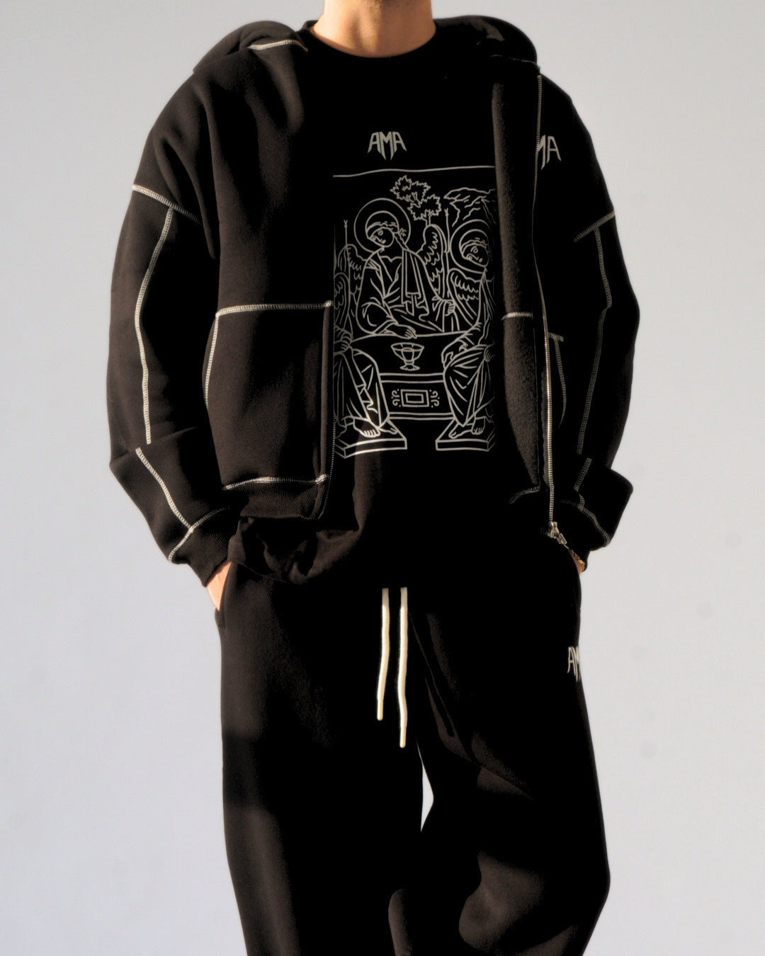 THE BASIC BLACK HOODIE AMARTIA